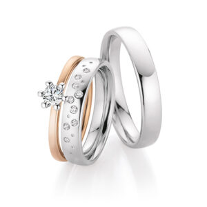 Eheringe aus Weißgold und Apricotgold mit Diamanten